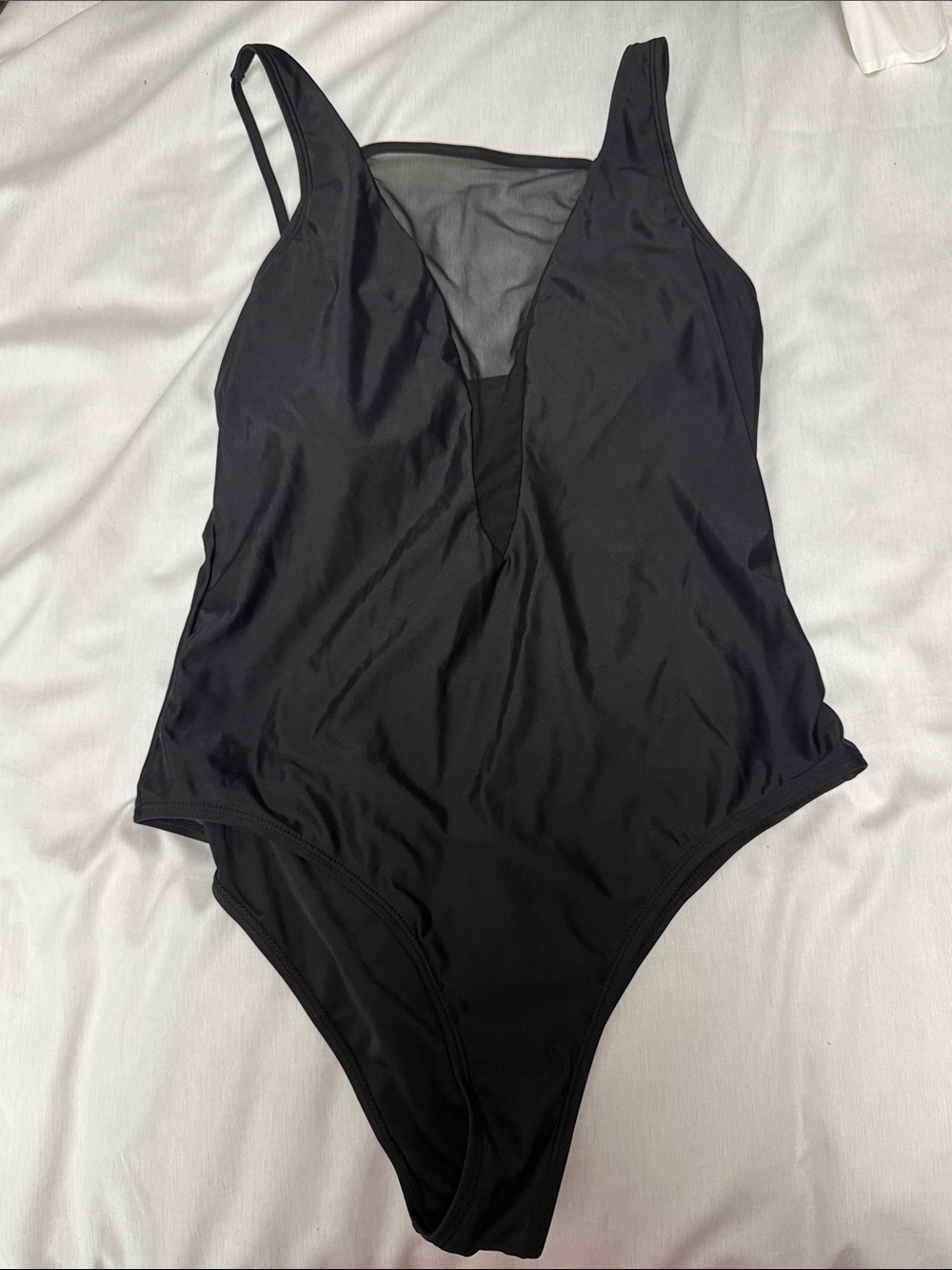 Sleek Black One-Piece Swimsuit with Mesh V-Neck